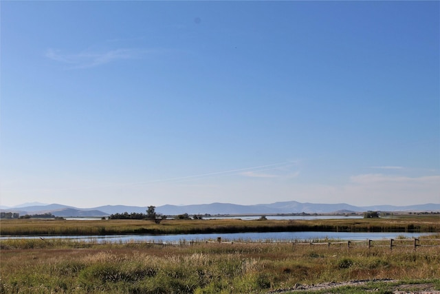 34575 Gunlock Rd, Charlo, MT 59824 - water view featuring mountains