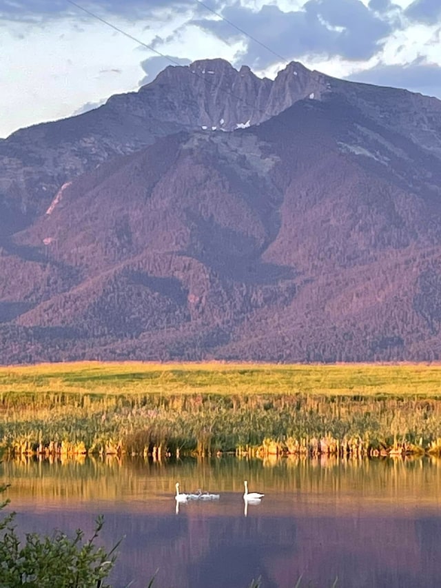 34575 Gunlock Rd, Charlo, MT 59824 - view of mountain backdrop featuring a nearby body of water