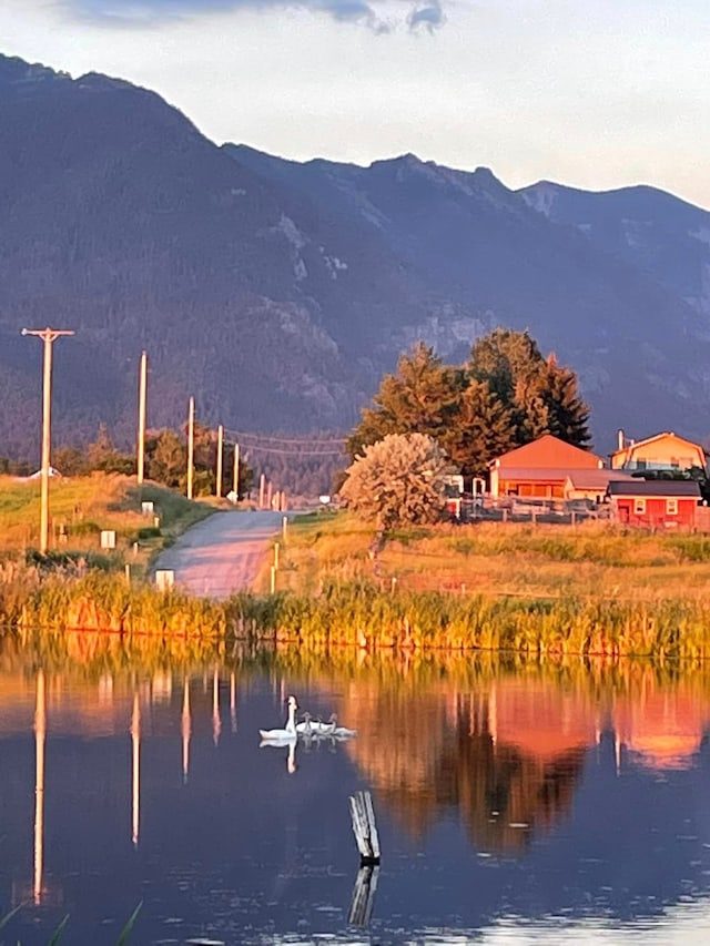 34575 Gunlock Rd, Charlo, MT 59824 - water view featuring mountains