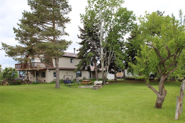 34575 Gunlock Rd, Charlo, MT 59824 - view of grassy yard featuring a deck