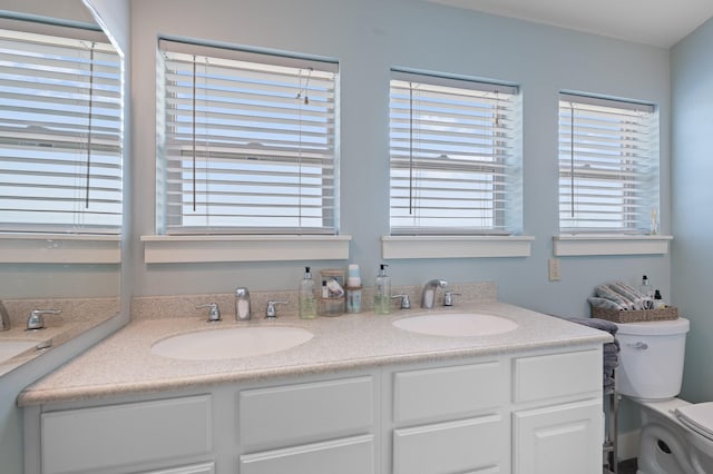 1221 Majestic View Ln, Kalispell, MT 59901 - bathroom with toilet, plenty of natural light, and double vanity