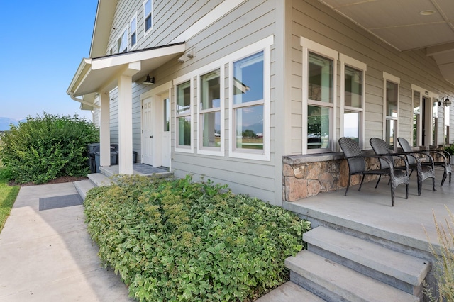 1221 Majestic View Ln, Kalispell, MT 59901 - view of exterior entry with covered porch and stone siding
