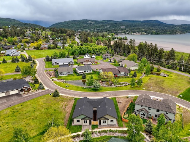 1050 Mill Creek Dr, Bigfork, MT 59911 - aerial perspective of suburban area with a water and mountain view