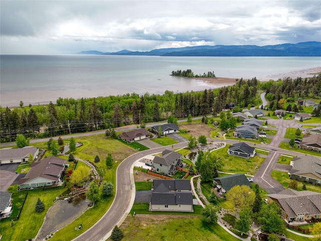 1050 Mill Creek Dr, Bigfork, MT 59911 - aerial perspective of suburban area featuring a water and mountain view
