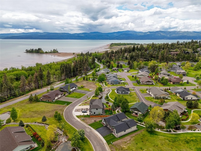 1050 Mill Creek Dr, Bigfork, MT 59911 - aerial perspective of suburban area with a water and mountain view