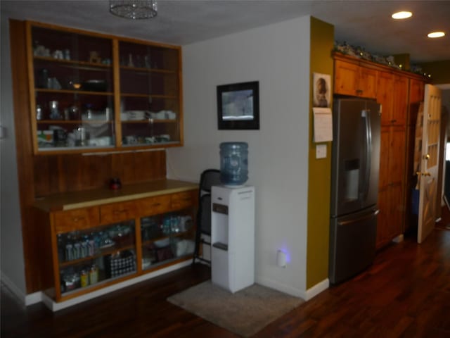 3115 8th Ave N, Great Falls, MT 59401 - kitchen with stainless steel refrigerator with ice dispenser, baseboards, dark wood-style floors, recessed lighting, and light countertops