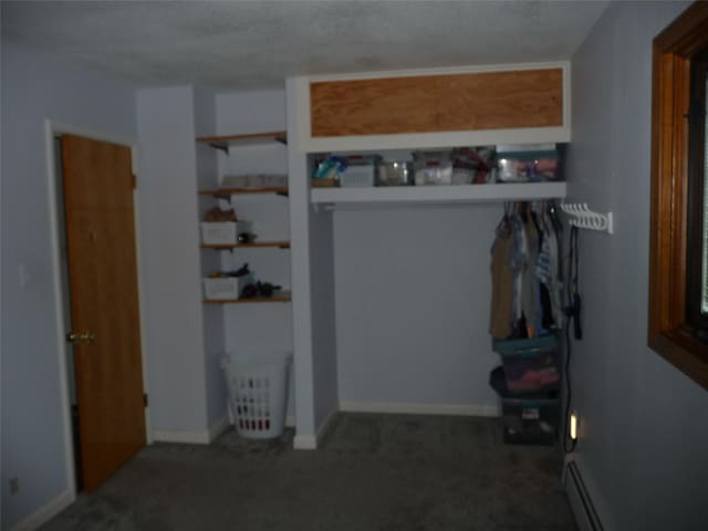 3115 8th Ave N, Great Falls, MT 59401 - carpeted bedroom with a baseboard radiator and baseboards