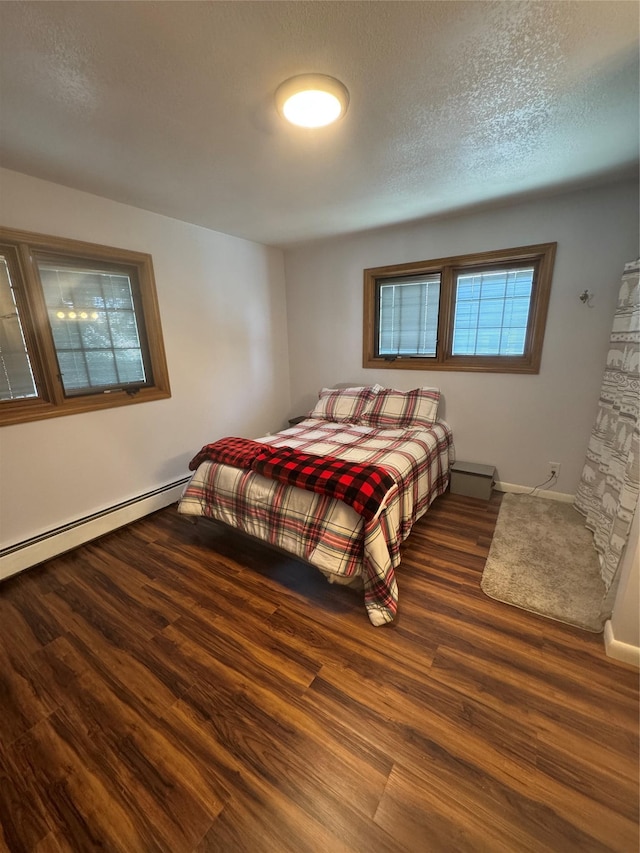 3115 8th Ave N, Great Falls, MT 59401 - bedroom with wood finished floors and a textured ceiling