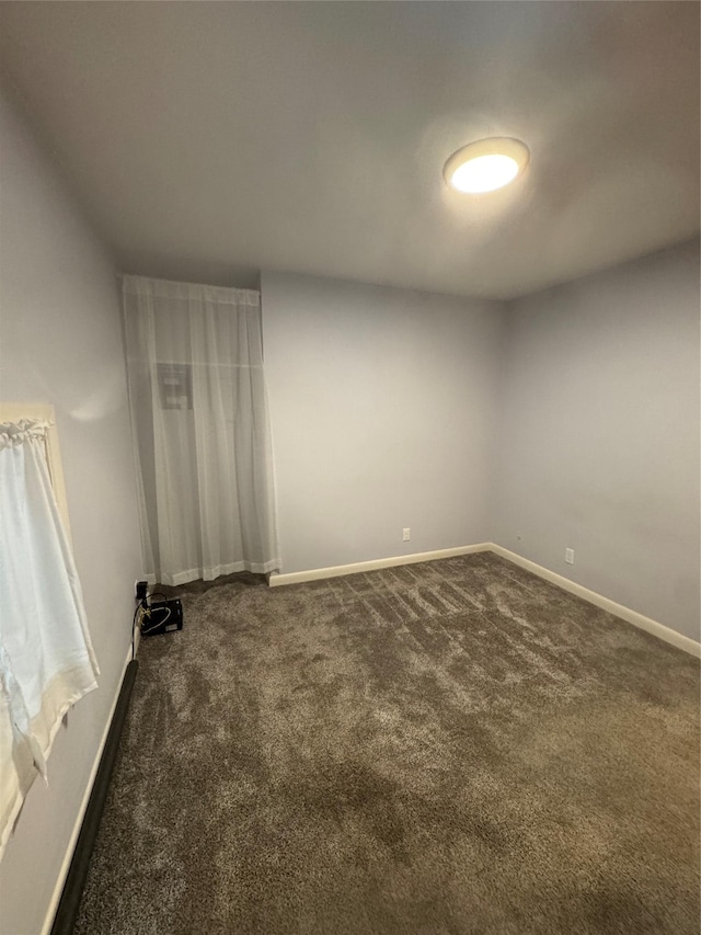 3115 8th Ave N, Great Falls, MT 59401 - empty room featuring dark colored carpet