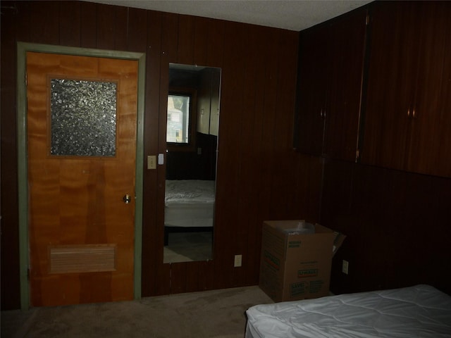 3115 8th Ave N, Great Falls, MT 59401 - bedroom featuring carpet floors and wood walls