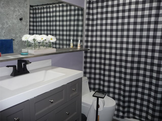 3115 8th Ave N, Great Falls, MT 59401 - full bath with wallpapered walls, vanity, toilet, and a shower with curtain