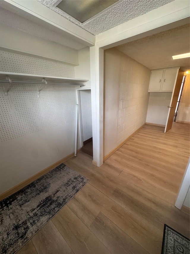 3115 8th Ave N, Great Falls, MT 59401 - below grade area with light wood-style flooring and baseboards