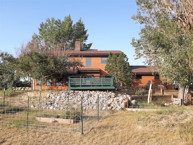 314 4th Ave NE, Cut Bank, MT 59427 - rear view of property featuring a chimney