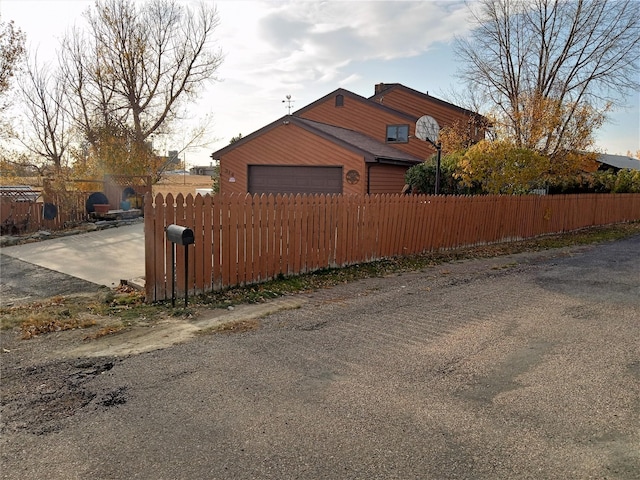 314 4th Ave NE, Cut Bank, MT 59427 - view of home's exterior featuring an attached garage