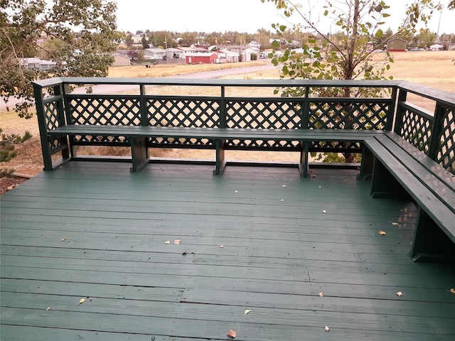314 4th Ave NE, Cut Bank, MT 59427 - wooden deck featuring a residential view