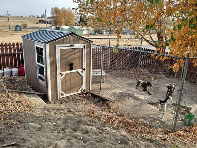 314 4th Ave NE, Cut Bank, MT 59427 - view of shed with a fenced backyard