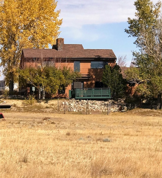 314 4th Ave NE, Cut Bank, MT 59427 - back of property with a chimney