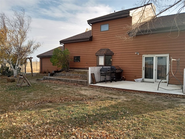 314 4th Ave NE, Cut Bank, MT 59427 - rear view of property with a lawn and roof with shingles
