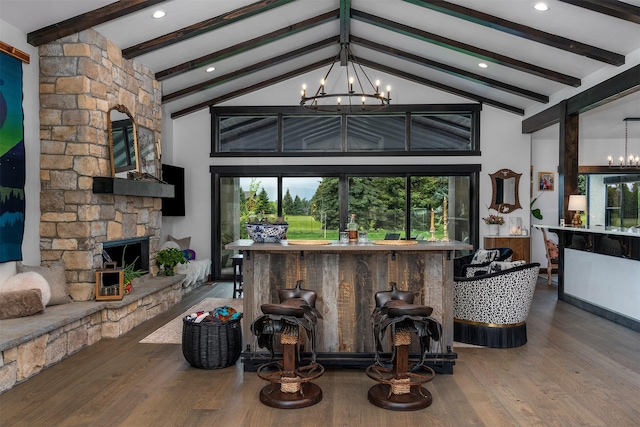 344 Chapman Ln, Bigfork, MT 59911 - living area featuring a chandelier, plenty of natural light, and wood finished floors