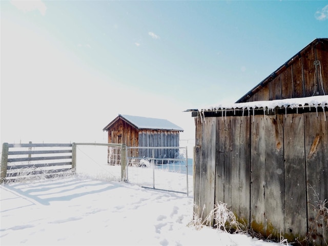 15 Perrin Ln, Hot Springs, MT 59845 - snowy yard with an outdoor structure