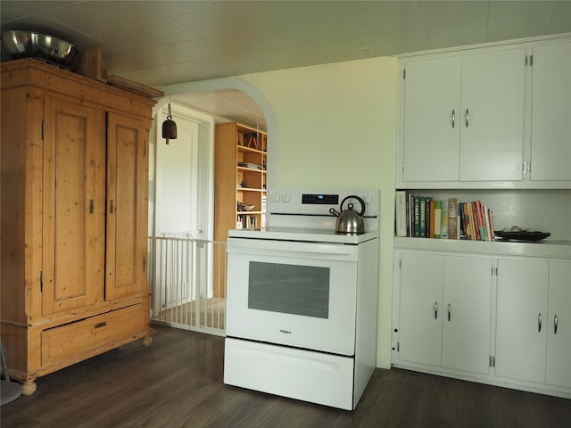 15 Perrin Ln, Hot Springs, MT 59845 - kitchen with white electric stove, dark wood finished floors, and arched walkways