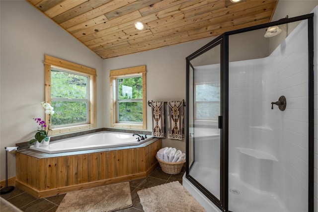217 Forest Ridge Trl, Kila, MT 59920 - full bath with wooden ceiling, vaulted ceiling, a stall shower, a garden tub, and tile patterned floors