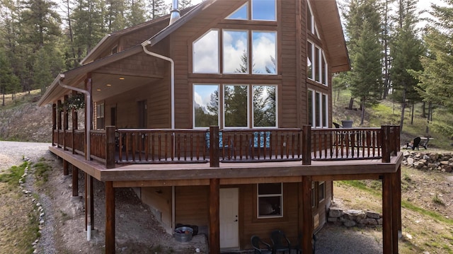 217 Forest Ridge Trl, Kila, MT 59920 - rear view of house featuring a deck