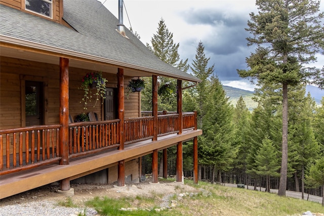 217 Forest Ridge Trl, Kila, MT 59920 - wooden terrace featuring a forest view