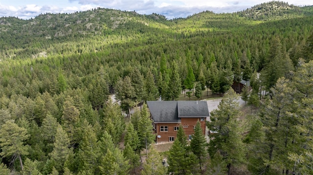 217 Forest Ridge Trl, Kila, MT 59920 - view from above of property featuring a forest and a mountainous background