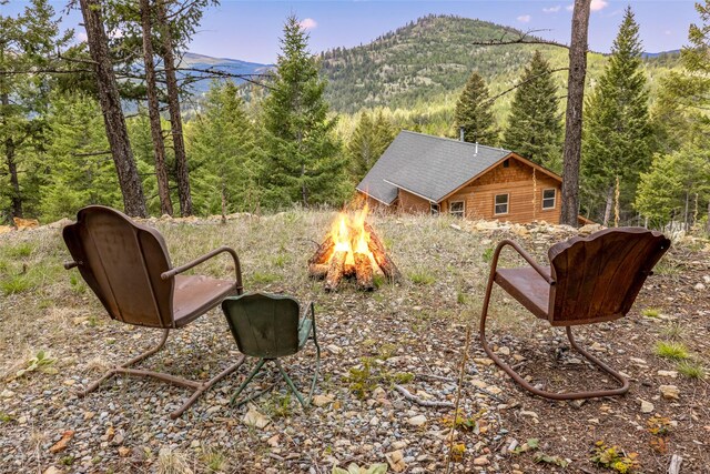 217 Forest Ridge Trl, Kila, MT 59920 - view of mountain backdrop featuring a heavily wooded area