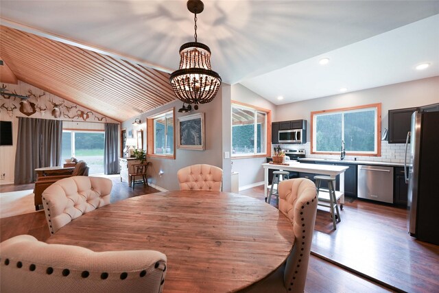 2 Cedar Grove Ln, Noxon, MT 59853 - wooden deck featuring a view of trees, a ceiling fan, a garden, a mountain view, and grilling area