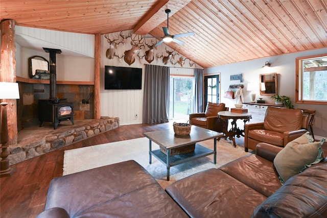 2 Cedar Grove Ln, Noxon, MT 59853 - living room with wooden ceiling, wood-type flooring, plenty of natural light, a ceiling fan, and a wood stove