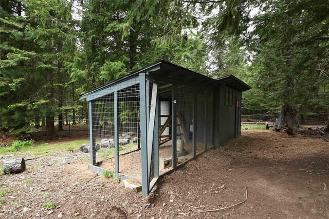 2 Cedar Grove Ln, Noxon, MT 59853 - bedroom with wooden ceiling and wood finished floors