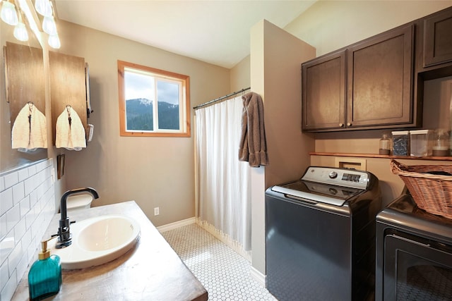 2 Cedar Grove Ln, Noxon, MT 59853 - laundry area featuring washing machine and dryer and baseboards