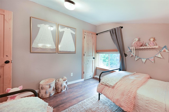 2 Cedar Grove Ln, Noxon, MT 59853 - bedroom with wood finished floors, baseboards, and lofted ceiling
