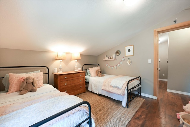 2 Cedar Grove Ln, Noxon, MT 59853 - bedroom with vaulted ceiling, wood finished floors, and baseboards