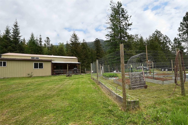 2 Cedar Grove Ln, Noxon, MT 59853 - view of green lawn featuring a garden