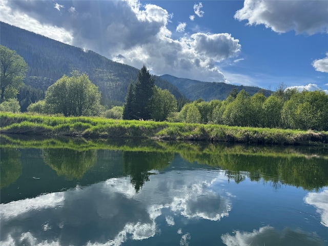 2 Cedar Grove Ln, Noxon, MT 59853 - water view with a mountainous background and a heavily wooded area