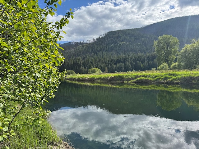 2 Cedar Grove Ln, Noxon, MT 59853 - water view with a forest and mountains