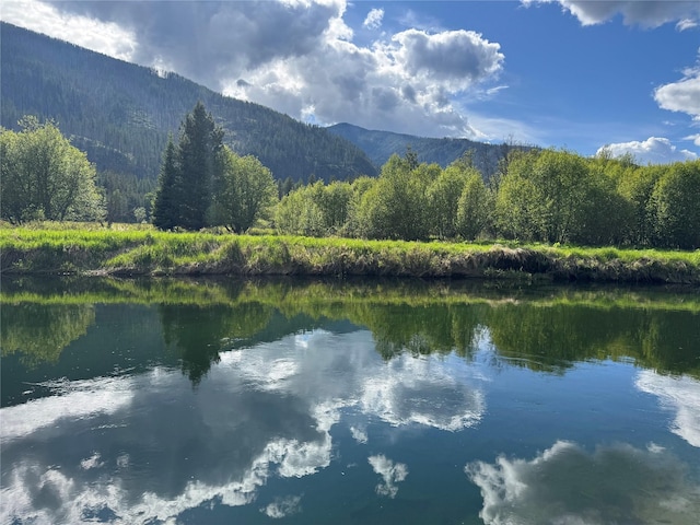 2 Cedar Grove Ln, Noxon, MT 59853 - water view featuring mountains and a heavily wooded area