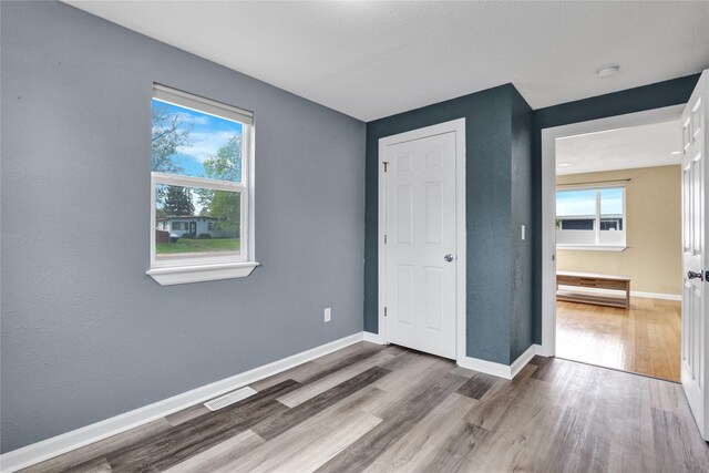 1721 13th Ave S, Great Falls, MT 59405 - unfurnished bedroom featuring wood finished floors and baseboards