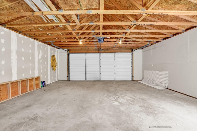 1721 13th Ave S, Great Falls, MT 59405 - garage featuring a garage door opener