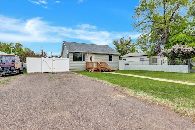 1721 13th Ave S, Great Falls, MT 59405 - bungalow-style house with a gate and a shingled roof