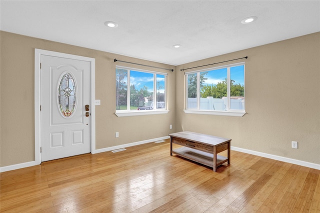 1721 13th Ave S, Great Falls, MT 59405 - entryway with light wood-style flooring, baseboards, and recessed lighting