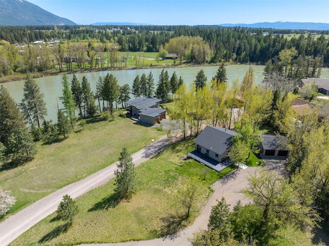 550 Talbot Rd, Columbia Falls, MT 59912 - drone / aerial view of a water and mountain view and a heavily wooded area