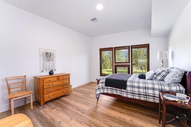 550 Talbot Rd, Columbia Falls, MT 59912 - bedroom with light wood-style flooring and baseboards