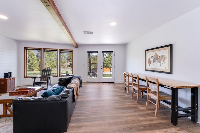 550 Talbot Rd, Columbia Falls, MT 59912 - living area with beamed ceiling, wood finished floors, french doors, and recessed lighting