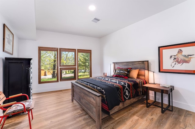 550 Talbot Rd, Columbia Falls, MT 59912 - bedroom with light wood finished floors and baseboards