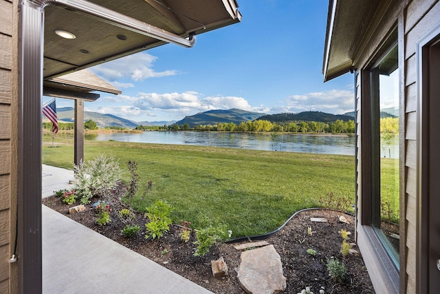17 River Runs Ct, Plains, MT 59859 - view of grassy yard with a water and mountain view