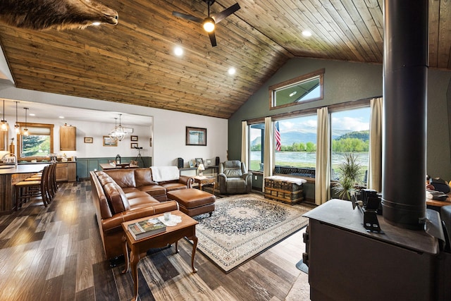 17 River Runs Ct, Plains, MT 59859 - living area with dark wood-type flooring, high vaulted ceiling, ceiling fan, wood ceiling, and healthy amount of natural light